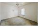 Simple bedroom with ceiling fan and window at 1307 W Congress Ave, Indianapolis, IN 46208