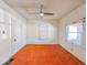 Simple bedroom with orange carpet and ceiling fan at 1307 W Congress Ave, Indianapolis, IN 46208