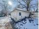 Small, weathered garage in snowy backyard at 1307 W Congress Ave, Indianapolis, IN 46208