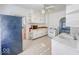 Efficient kitchen featuring white cabinets and gas range at 1307 W Congress Ave, Indianapolis, IN 46208