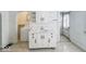 Small kitchen with white cabinets and a built in sink at 1307 W Congress Ave, Indianapolis, IN 46208