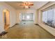 Open living room showcasing hardwood floors and a ceiling fan at 1307 W Congress Ave, Indianapolis, IN 46208