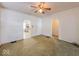 Spacious living room featuring hardwood floors and an arched doorway at 1307 W Congress Ave, Indianapolis, IN 46208