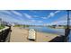 Sandy beach area at Saxony Beach, featuring lake access and signage at 13643 E 131St St # 4B, Fishers, IN 46037