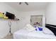 Main bedroom with a large bed and TV at 151 Bakemeyer St, Indianapolis, IN 46225