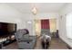 Living room with hardwood floors, two sofas and a TV at 151 Bakemeyer St, Indianapolis, IN 46225