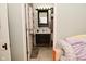 Modern bathroom with sleek vanity and storage at 1719 Fletcher Ave, Indianapolis, IN 46203