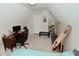 Charming bedroom features a built-in bookcase, desk, and mirror for comfort and storage at 1719 Fletcher Ave, Indianapolis, IN 46203