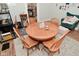 Well-lit dining area with a traditional wooden table and seating for four at 1719 Fletcher Ave, Indianapolis, IN 46203