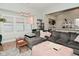 Bright living room with a modern sofa, stylish lighting, and open layout at 1719 Fletcher Ave, Indianapolis, IN 46203