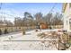 Deck and fenced backyard with string lights at 1830 Sweet Blossom Ln, Indianapolis, IN 46229