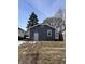 Backyard with detached garage, partially covered in snow at 2743 Barth Ave, Indianapolis, IN 46203