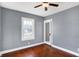 Well-lit bedroom with hardwood floors and ceiling fan at 2743 Barth Ave, Indianapolis, IN 46203