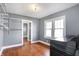 Laundry room with washer, dryer, and built-in shelving at 2743 Barth Ave, Indianapolis, IN 46203