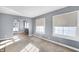 Living room with an arched doorway and hardwood floors at 2743 Barth Ave, Indianapolis, IN 46203