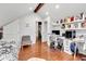 Cozy bedroom featuring a built-in workspace and hardwood floors at 333 S 4Th St, Zionsville, IN 46077