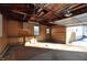 Spacious garage with workshop area and shelving at 336 N Whittier Pl, Indianapolis, IN 46219