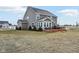 House with deck, sunroom and grassy backyard at 373 Brianne Ln, Danville, IN 46122