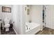 Small bathroom with toilet and garden tub at 373 Brianne Ln, Danville, IN 46122