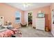 Bedroom with a dresser, ceiling fan, and carpet at 373 Brianne Ln, Danville, IN 46122