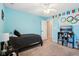 Bedroom with twin bed, ceiling fan, and carpet at 373 Brianne Ln, Danville, IN 46122