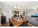 Open concept dining area with views into the kitchen and living room at 373 Brianne Ln, Danville, IN 46122