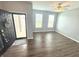 Inviting entryway into a neutral living space with hardwood floors and windows for natural light at 373 Brianne Ln, Danville, IN 46122