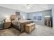 Main bedroom with large bed, TV, and fireplace at 373 Brianne Ln, Danville, IN 46122