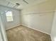 Walk-in closet with built in wire shelving and carpeting at 373 Brianne Ln, Danville, IN 46122