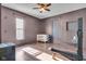 Home gym with hardwood floors and large windows at 3816 Rookwood Ave, Indianapolis, IN 46208