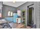 Kitchen features stainless steel appliances and a light blue refrigerator at 3816 Rookwood Ave, Indianapolis, IN 46208