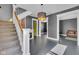 Bright living area with hardwood floors, and an open floor plan at 3816 Rookwood Ave, Indianapolis, IN 46208