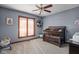 Bright Bedroom features a crib, window seating and playful decor at 4050 Woodshire Pl, Clayton, IN 46118