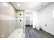 Modern bathroom with walk-in shower, toilet and spacious storage at 459 N Concord St, Indianapolis, IN 46222