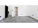 Spacious bedroom with grey carpet and access to bathroom at 459 N Concord St, Indianapolis, IN 46222