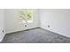 Bright bedroom with grey carpet and large windows at 459 N Concord St, Indianapolis, IN 46222