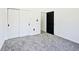 Bedroom with grey carpet, white walls and closet at 459 N Concord St, Indianapolis, IN 46222