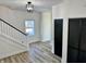 Entryway with stairs, closet, and new flooring at 633 S 17Th St, Elwood, IN 46036