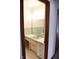 Bathroom with vanity, sink, and mirror at 6628 E Michigan St, Indianapolis, IN 46219