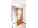 Open closet with sliding doors and shelving at 6628 E Michigan St, Indianapolis, IN 46219