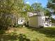 House exterior with deck and landscaped yard at 7812 Preservation Dr, Indianapolis, IN 46278