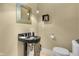 Modern powder room with granite vanity and updated fixtures at 7812 Preservation Dr, Indianapolis, IN 46278