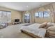 Spacious bedroom with large windows and TV at 7812 Preservation Dr, Indianapolis, IN 46278