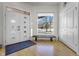 Bright and airy entryway with hardwood floors and modern doors at 7812 Preservation Dr, Indianapolis, IN 46278