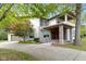 Modern two-story home with stone accents and attached garage at 7812 Preservation Dr, Indianapolis, IN 46278