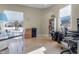 Bright home office with built-in shelving and hardwood floors at 7812 Preservation Dr, Indianapolis, IN 46278