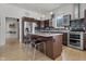 Updated kitchen with stainless steel appliances and island at 7812 Preservation Dr, Indianapolis, IN 46278