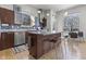 Modern kitchen with stainless steel appliances and granite countertops at 7812 Preservation Dr, Indianapolis, IN 46278