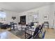 Open living area with hardwood floors, stylish furniture and large windows at 7812 Preservation Dr, Indianapolis, IN 46278