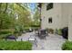 Spacious patio with seating area, landscaping, and grill at 7812 Preservation Dr, Indianapolis, IN 46278